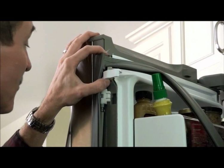 How do you replace the door seal on a Kenmore Elite refrigerator?