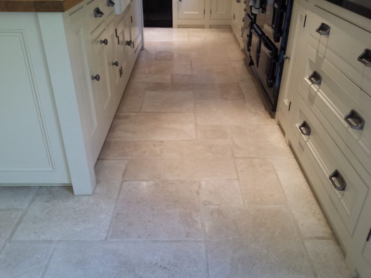 How do you restore a natural stone floor?