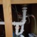how high should a kitchen sink drain be
