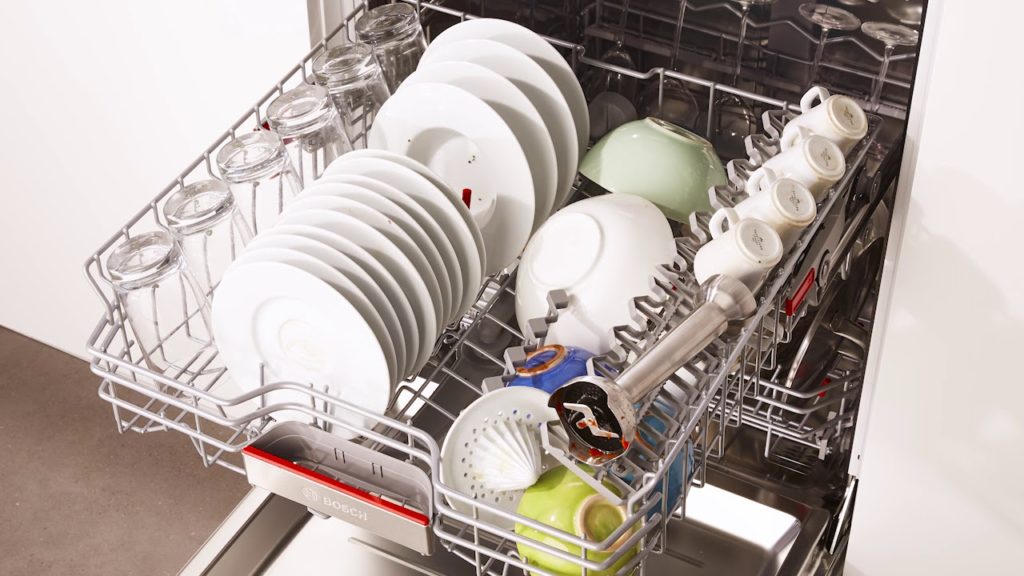 How do you secure a dishwasher under the counter?