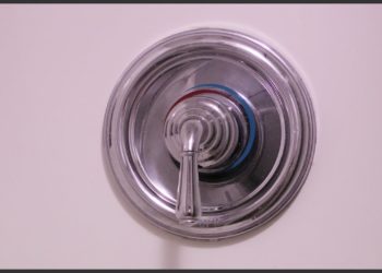 How do you fix a loose shower handle?