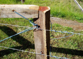 How do you tighten a loose fence wire?