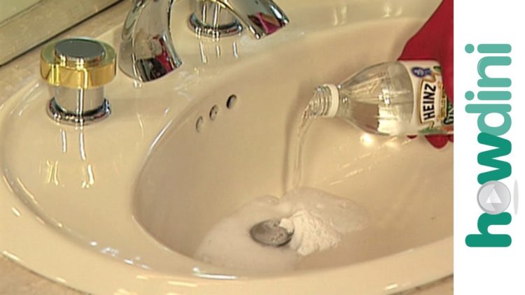 How do you unclog a utility sink drain?