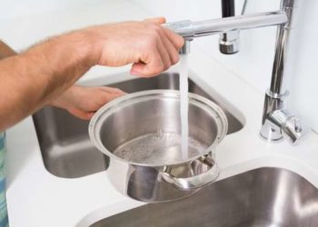how to unclog a toilet filled with water