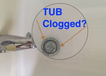 how do u unclog a tub