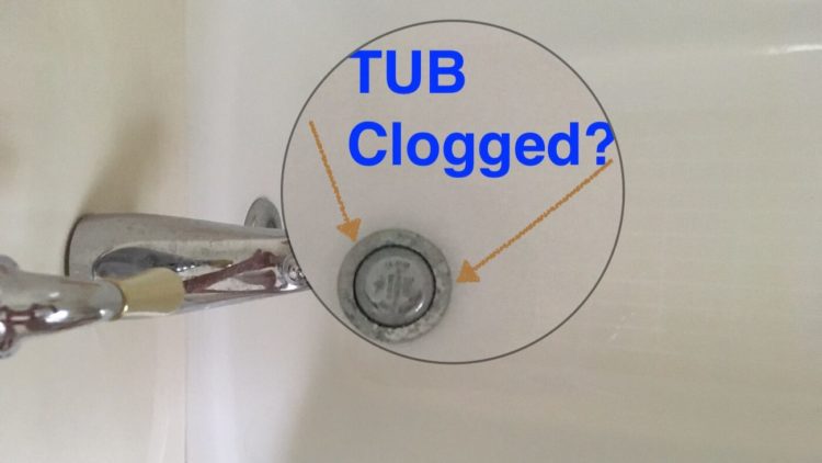 how do u unclog a tub