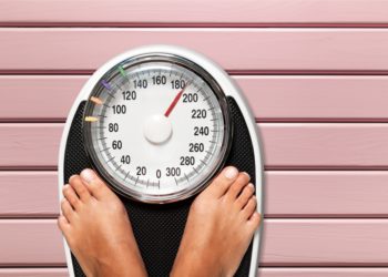 How do you weigh less on a scale?