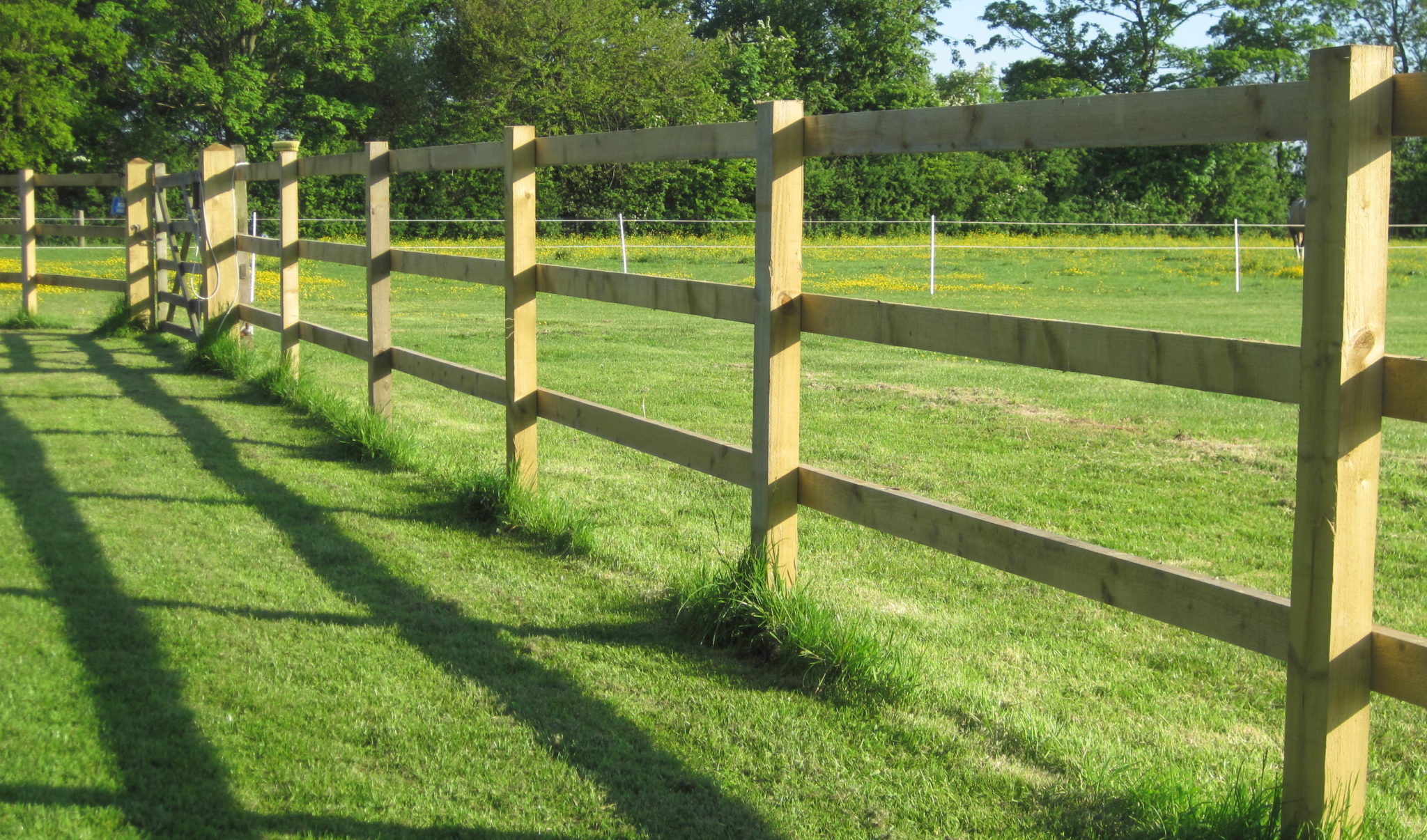 How far apart should post and rail fencing be?