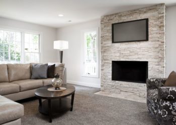 hanging lcd tv above fireplace