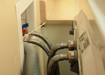 How long should a washing machine drain hose be?