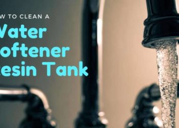 How do you empty a water softener resin tank?