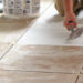 How do you apply Prism grout?