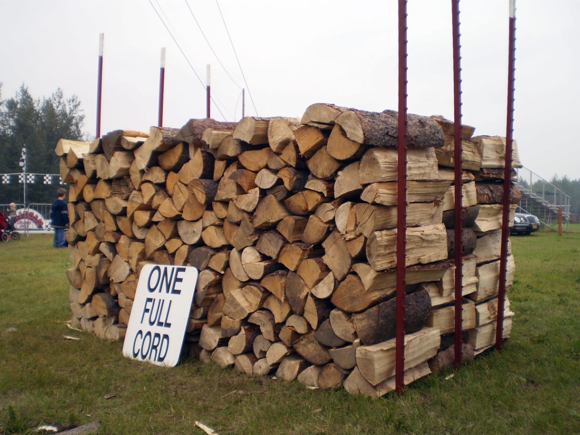 How many cords is a ton of firewood?