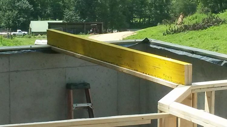 How much does a 6x6 pressure treated post weigh?