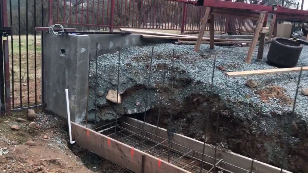 How much does a poured concrete retaining wall cost?