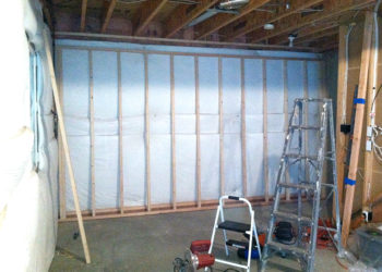 How far should studs be from basement wall?