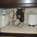 Can I install a reverse osmosis system myself?