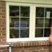 How do you replace a window in a brick wall?