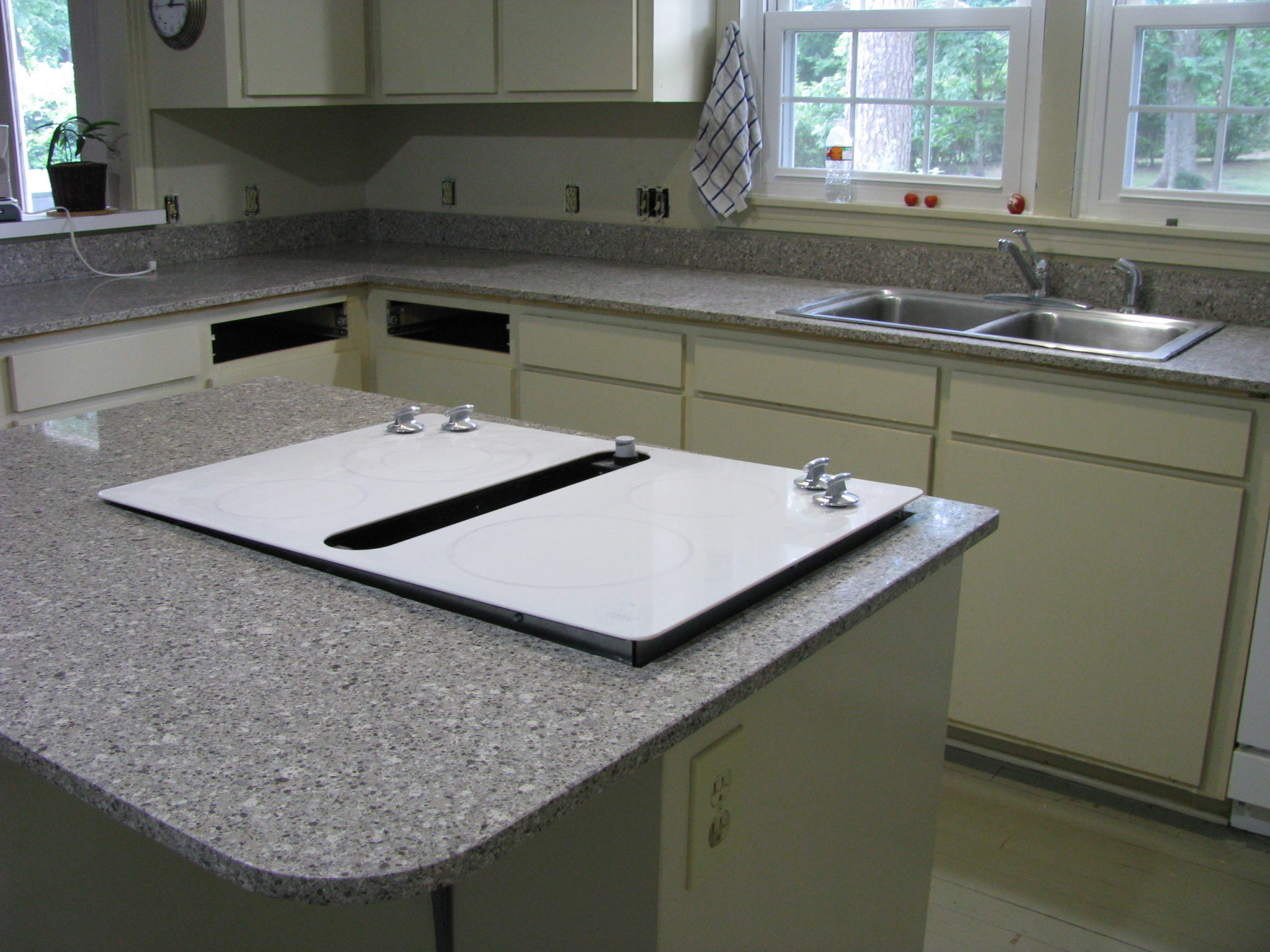 How much does it cost to refinish Corian countertops?