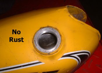 How do you fix a rusty motorcycle gas tank?