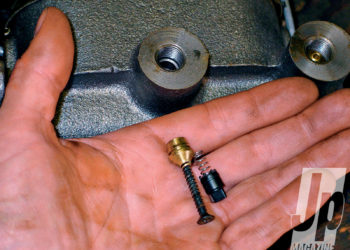 How do you check the pressure on a master cylinder?