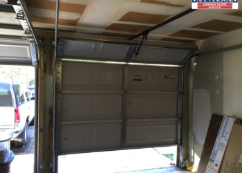 garage door jerks on way down