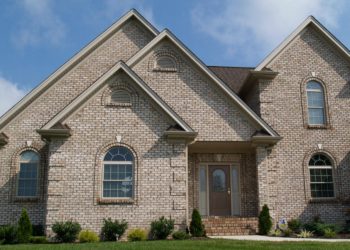 cost to brick a house vs siding