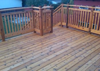 Is Cedar more expensive than treated wood?