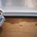 why is my fridge leaking water