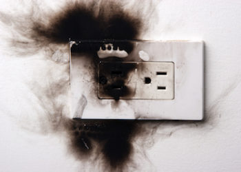 why is my outlet hot with nothing plugged in
