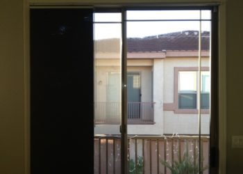 ice on inside of sliding glass door