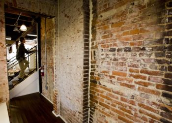 distressed painted brick exterior