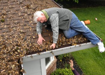 How do you clean second story gutters without a ladder?