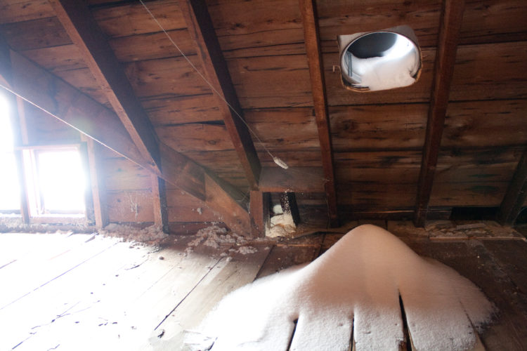 snow in attic from roof vents