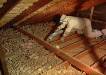 Is it OK to put flooring over blown in insulation?