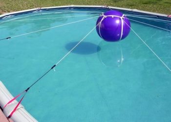 How do I keep my pillow in the middle of my pool?