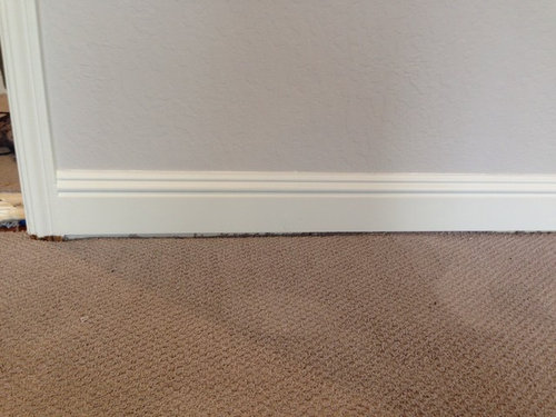 How Much Space Between Floor And Baseboard For Carpet