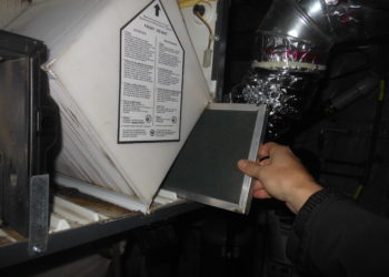 How do I clean my Venmar air exchanger filter?