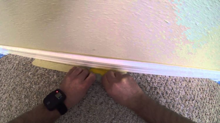 painting baseboards with carpet