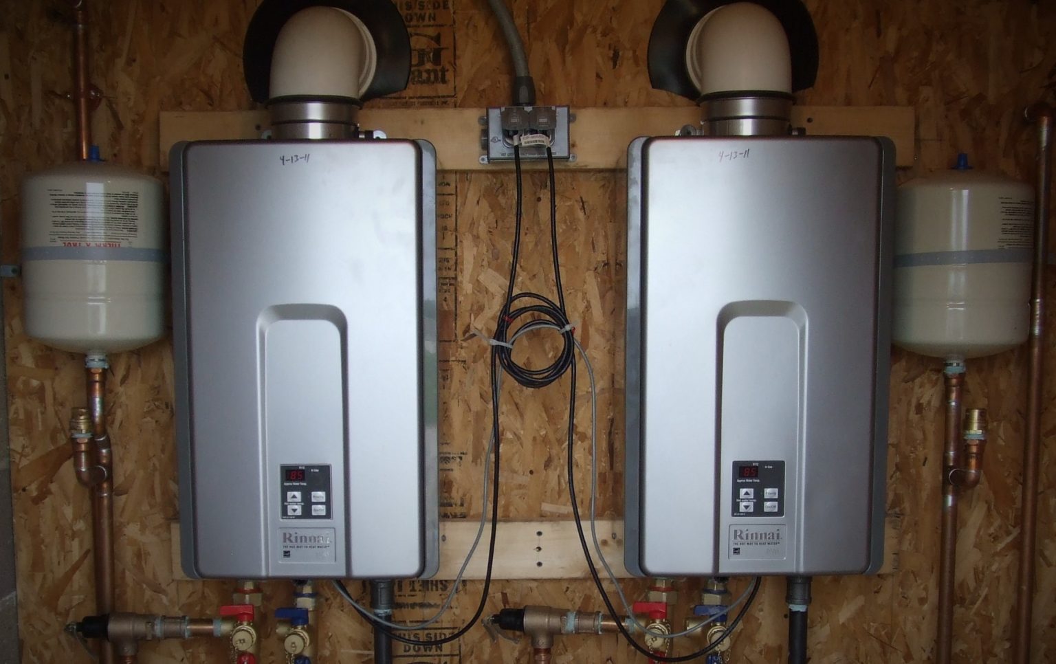 What are the advantages and disadvantages of a tankless water heater?
