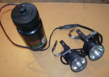 How do I put batteries in my bike lights?