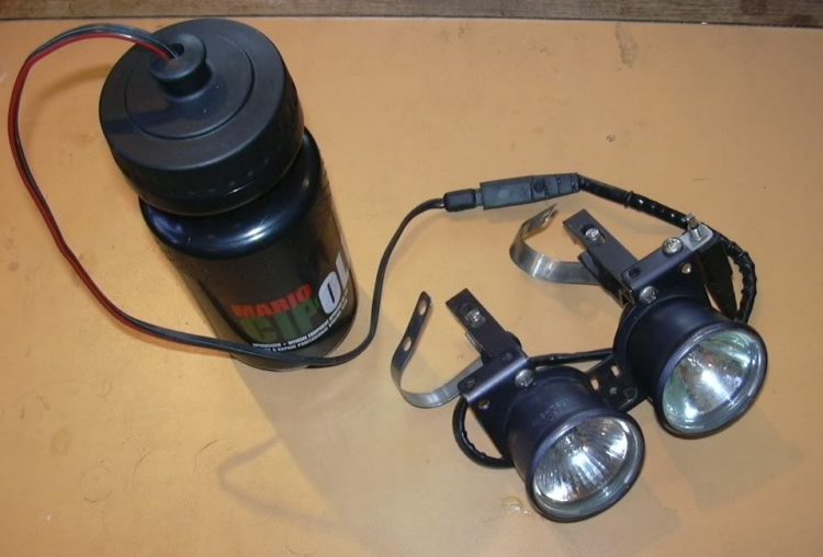 How do I put batteries in my bike lights?