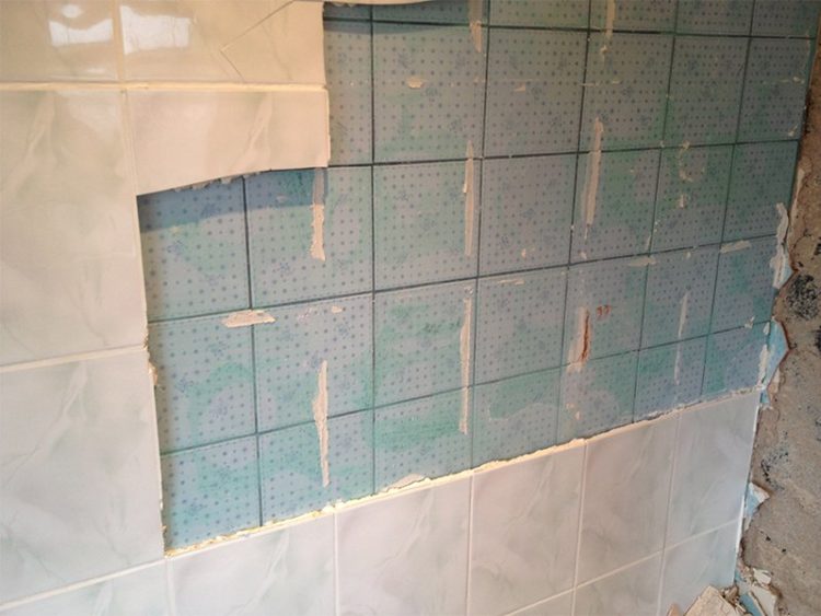 can you put bathroom wall panels over tiles