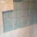can you put bathroom wall panels over tiles