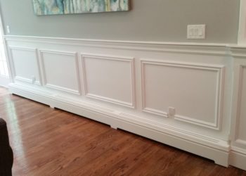 Can you cover baseboard heater with wood?