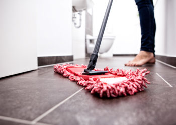 What is the best way to clean natural stone floors?