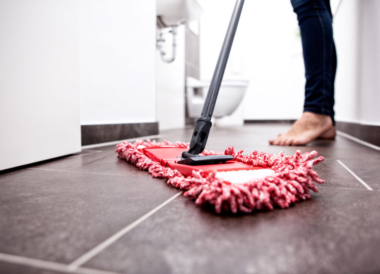 What is the best way to clean natural stone floors?
