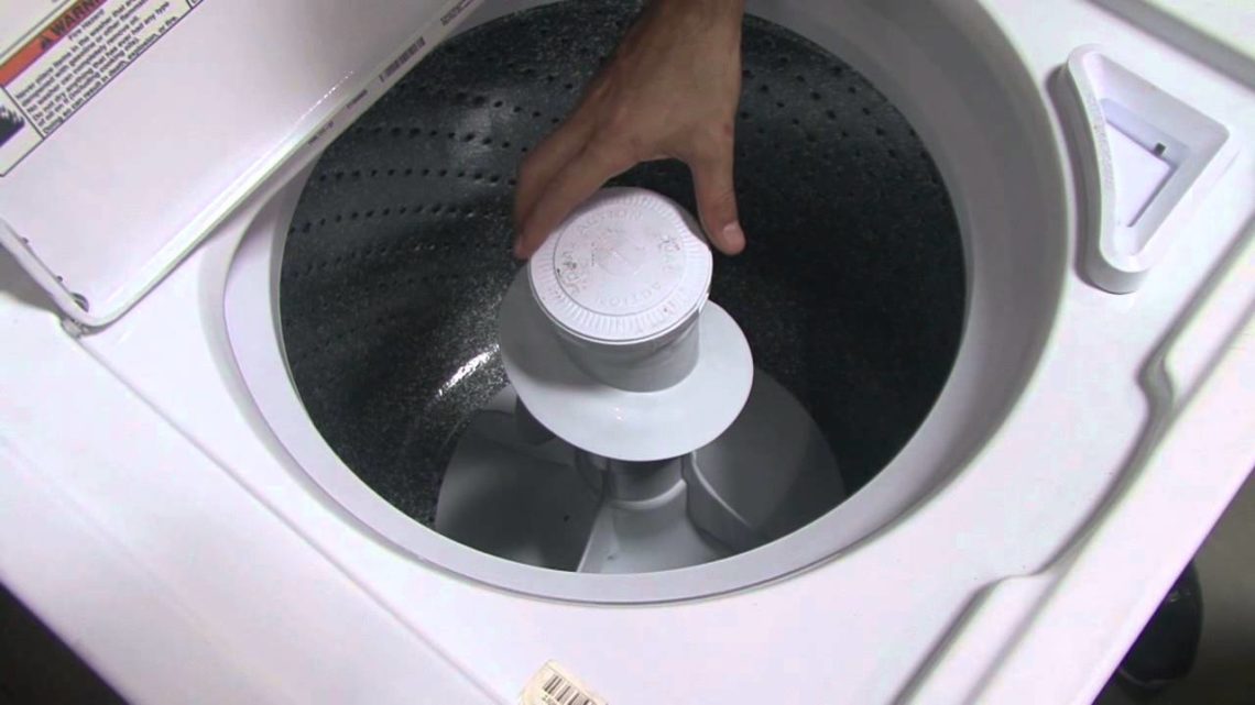 What causes a front load washer to leak from the bottom?