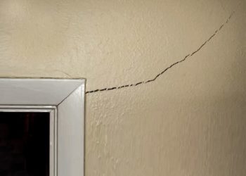 fixing drywall cracks around doors