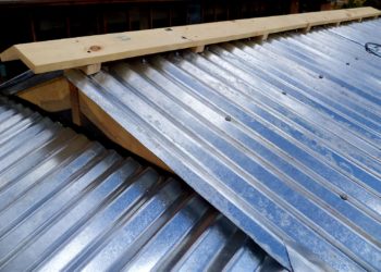 How do you waterproof a corrugated iron roof?
